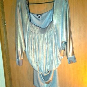 Shimmery top, or short dress